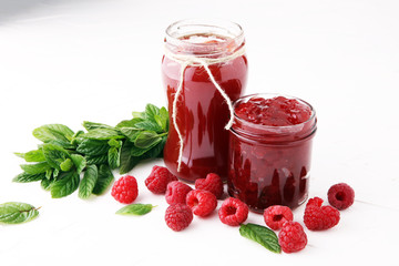 Fresh raspberry jam with toast or bread for breakfast