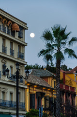 Moon over the Old Town in Seville, Spain