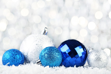 Christmas baubles on bokeh background