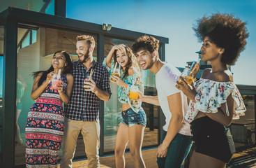 Friends partying on a rooftop
