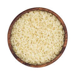 Parboiled rice in a wooden bowl isolated on a white background. Top view