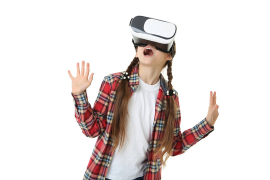 Young girl in virtual reality goggles on white background
