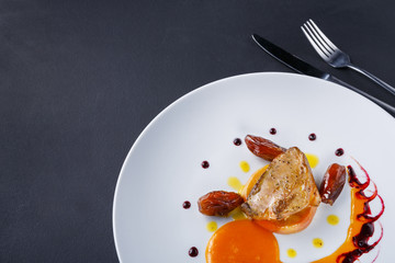 Roasted goose liver with date fruit and apple