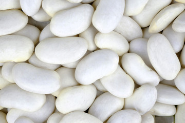 Fototapeta na wymiar Macro of dry white beans. View from above.