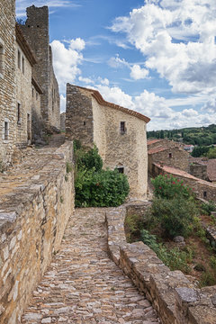 Top view of the rooftops of the village Saint Montan with the remains of an old city wall