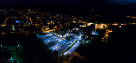 Aerial view of the city at night. Horizontal panorama.