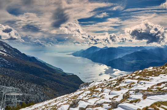 View of the Lake Garda from mount of Monte Baldo, Italy. Garda lake in the winter  time