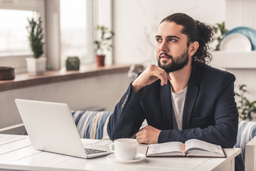 Stylish guy working