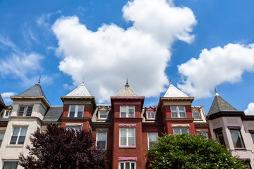 Row houses in the Washington DC neighborhood of Bloomingdale on a summer day.