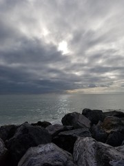 Rocky Landscape with Ocean and Clouds