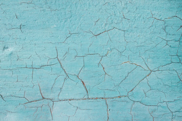 Chapped blue paint on a iron base.