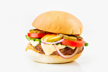 Burger With Beef, Tomato, Cheese, Lettuce and Onion. Close up