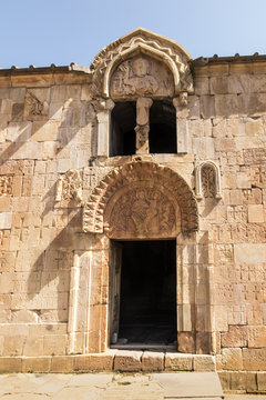 Armenia, the monastery of Noravank. The central entrance to the church of John the Baptist with a unique bas-relief depicting God the Father.