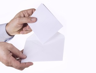 Fototapeta premium White envelope with paper note with man hand on the white background