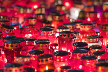 Burning candles on cemetery