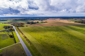 Aerial view of amazing summer landscape. Fields and meadows from above.