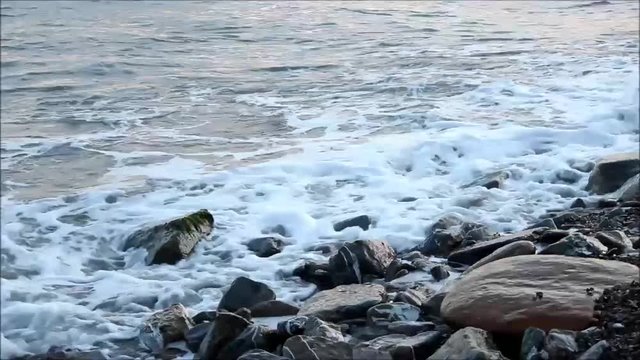 The sea waves are beating against the shore. The Black Sea, the city of Khosta, Russia, 2017