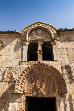 Armenia, the monastery of Noravank. The central entrance to the church of John the Baptist with a unique bas-relief depicting God the Father.