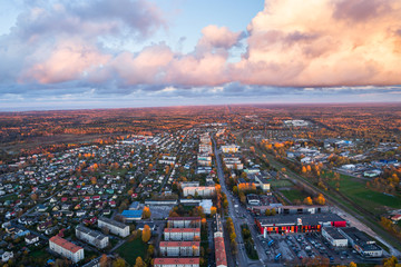Obraz premium Aerial view of the city at sunset. Beautiful autumn city landscape.