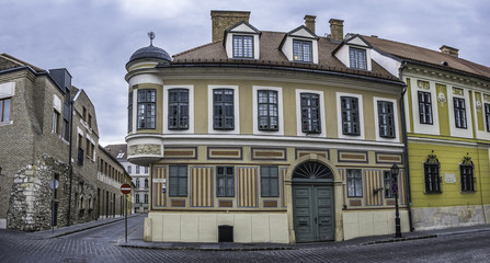 Fototapeta na wymiar Street with old houses on Buda in Budapest, Hungary
