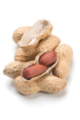 Roasted peanuts isolated on white