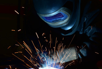 Fototapeta na wymiar Industrial steel welder in factory
