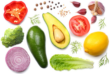 healthy food. mix of avocado, lemon, tomato, red onion, garlic, sweet bell pepper and salad isolated on white background top view