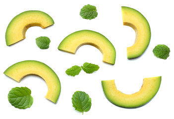 healthy food. sliced avocado isolated on white background. top view