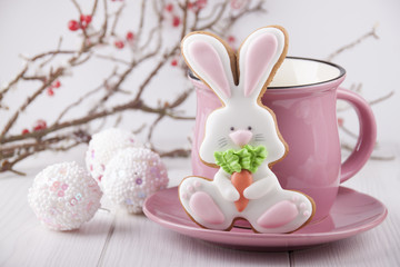Gingerbread in the form of a hare with a pink mug