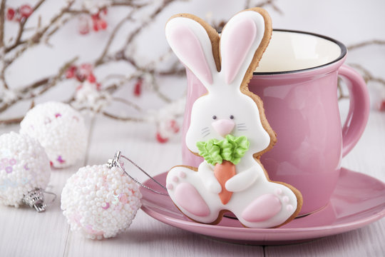 Gingerbread in the form of a hare with a pink mug