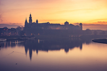 Fototapeta Krakow, Poland, Wawel Castle and Wawel cathedral in the morning over Vistula river  obraz
