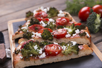 tart quiche with broccoli tomato and goat cheese