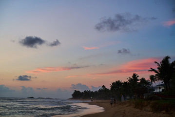 Fototapeta na wymiar beautiful tropical clouds durring ocean beach sunset