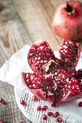 Pomegranate on the wooden board