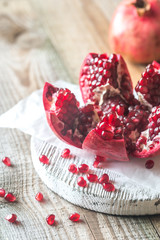 Pomegranate on the wooden board