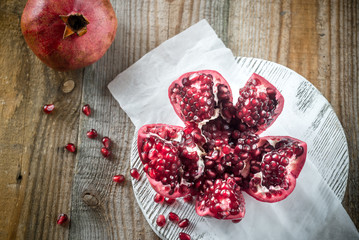 Pomegranate on the wooden board