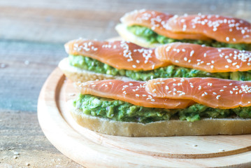 Toasts with guacamole and smoked salmon