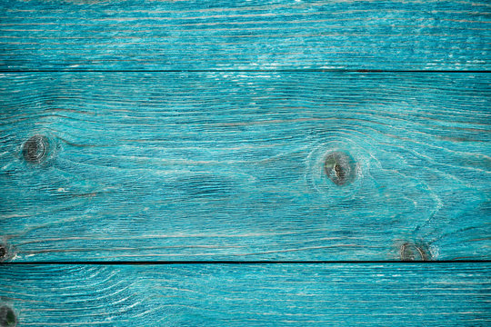 Blue wood background. Board closeup.