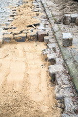 cobblestone street under renovation