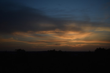 Sunset with golden clouds