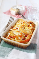 Gratin of potatoes, apples and Camembert cheese