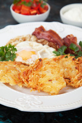 Hash browns with egg and bacon