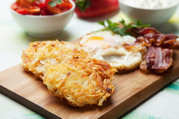 Hash browns with egg and bacon