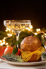 Winter holidays celebration with champagne and panettone traditional sweet italian dessert