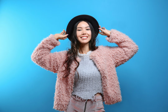 Beautiful hipster girl on blue background