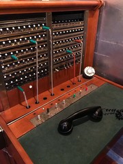 Vintage telephone switchboard and rotary phone