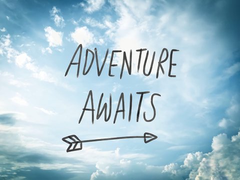 Adventure awaits word on blue sky and cloud background