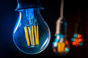 Incandescent lamp close-up. Lamp on a black background.