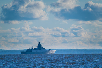 A warship on the horizon. Cruiser.