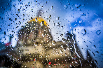 Rainy St. Petersburg. Rain drops on the glass. St. Isaac's Cathedral in St. Petersburg. Russia.